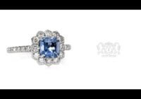 Leon Megé exclusive "Lotus" ring with a "Montana-blue" Asscher-cut sapphire in a diamond halo r7381