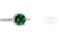 Leon Megé micro pave ring with sweet vivid-green tsavorite in a peek-a-boo halo r8120