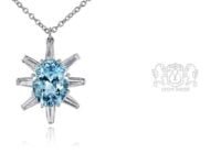 Leon Megé "Polar Star" pendant with an oval aquamarine and diamond tapered baguettes p8256