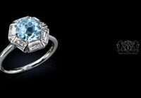 Leon Megé elegant right-hand ring with aquamarine in a halo of elongated French cut diamonds r7366