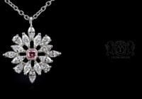 Leon Megé snowflake pendant with a natural pink diamond in mixed white diamond cluster p7328