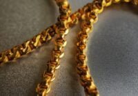 gold chain necklace on gray textile, Why Is Gold So Cheap In Thailand?